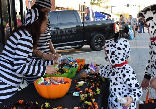 officers handing out candy