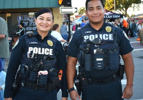 two officers at community outreach