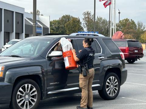 community outreach officer talking to driver